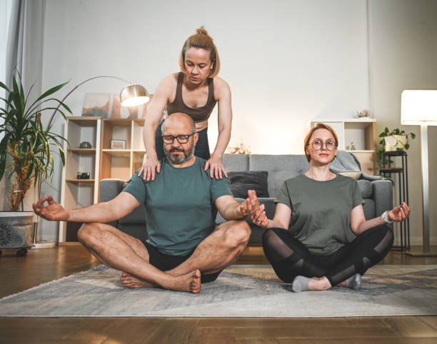 Small group bodyweight masterclass in a warm studio setting
